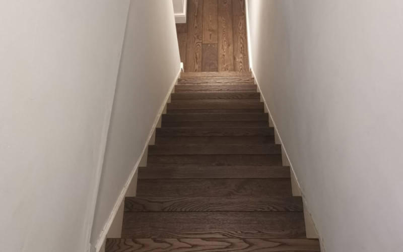 Clading Stairs in Dark Stained Oak planks