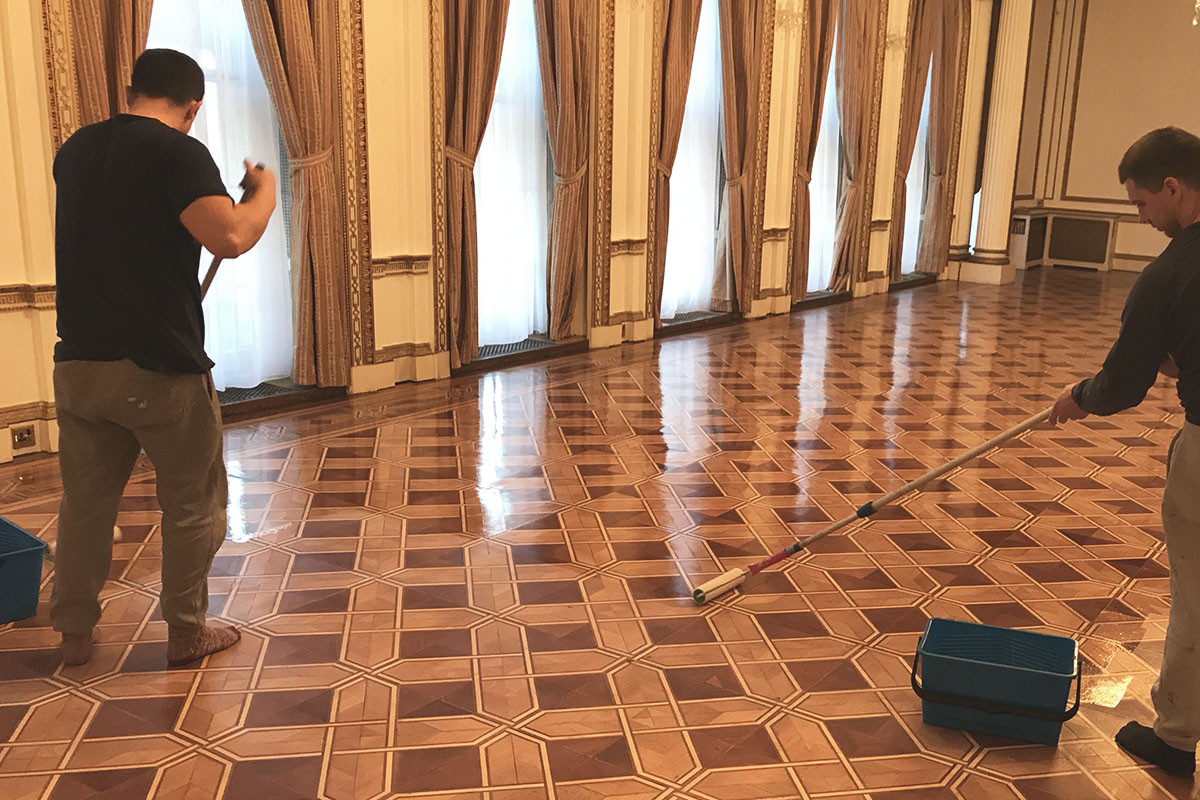 Re-lacquering of Mosaic panel flooring